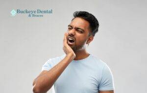 Teeth and gum pain in man
